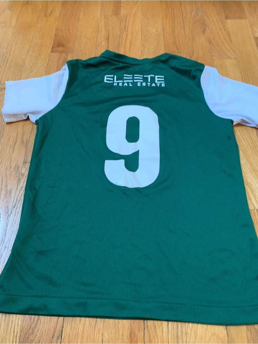 2 Nike Boys L Shirts : Defy Gravity' Nike tee and a green Milltown United jersey